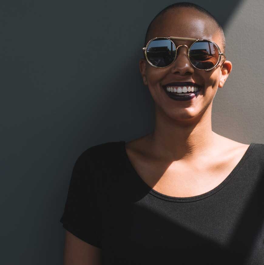 girl-smiling-shades-on